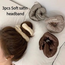 A set containing 3 ultra-soft satin hairbands/hair clips in random colors.