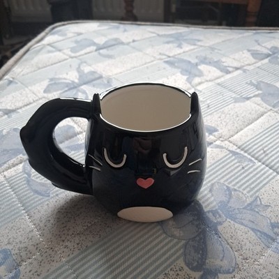 Feline feine schwarze Tasse in Katzenform