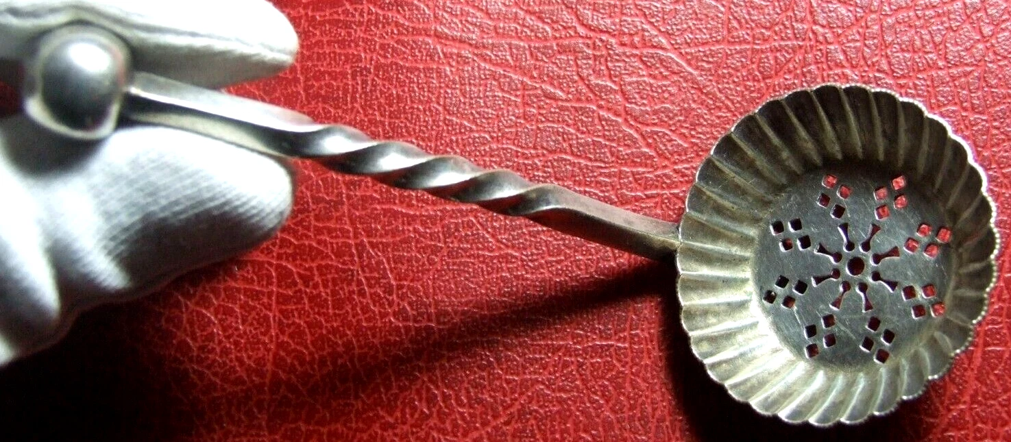 Vintage small tea strainer to identify