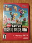 New ListingNintendo New Super Mario Bros. Wii Multiplayer Game With Manual Tested