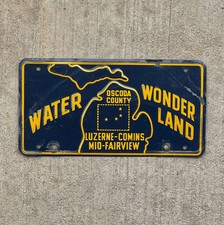 1960 Era Oscoda County Michigan Booster License Plate Auto Tag Water Wonderland