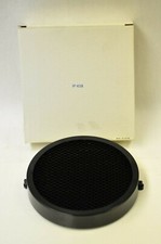 Honeycomb disc for flash head. Overall size 7 1/8 diameter. Mounting area 6 7/8"