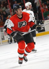 Mike Rathje Philadelphia Flyers skates at the NHL game with - Ice Hockey Photo 1