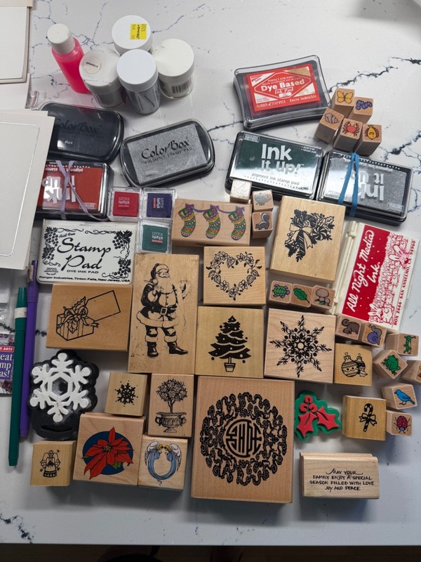 Bundle of rubber stamps with ink and other rubber stamp supplies
