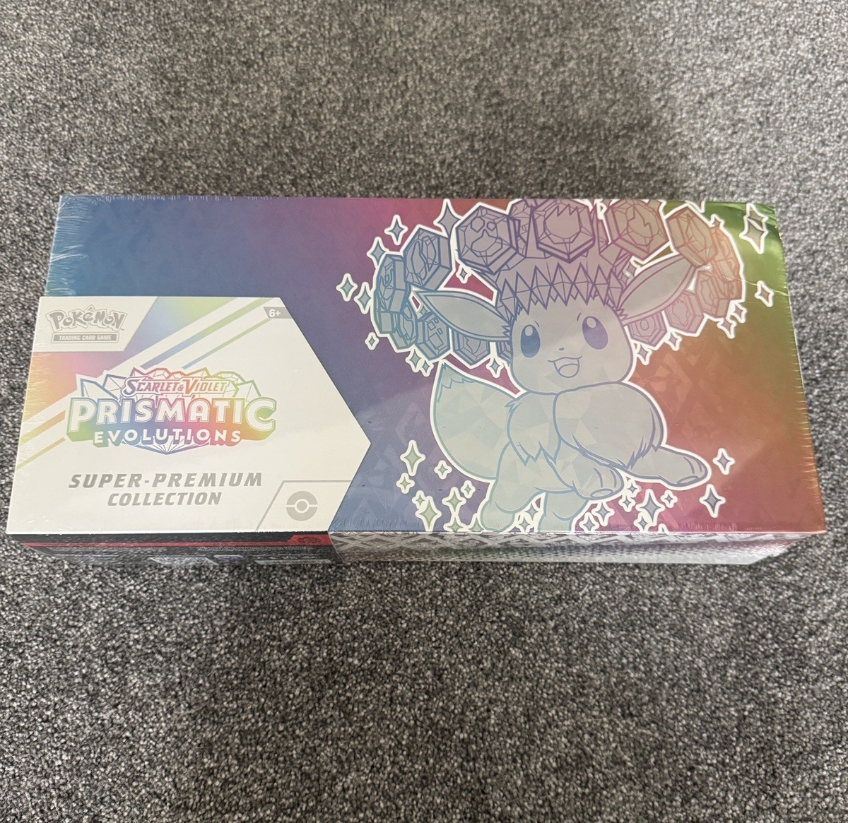 Pokémon TCG Prismatic Evolutions SPC Super Premium Collection New **DENTED**