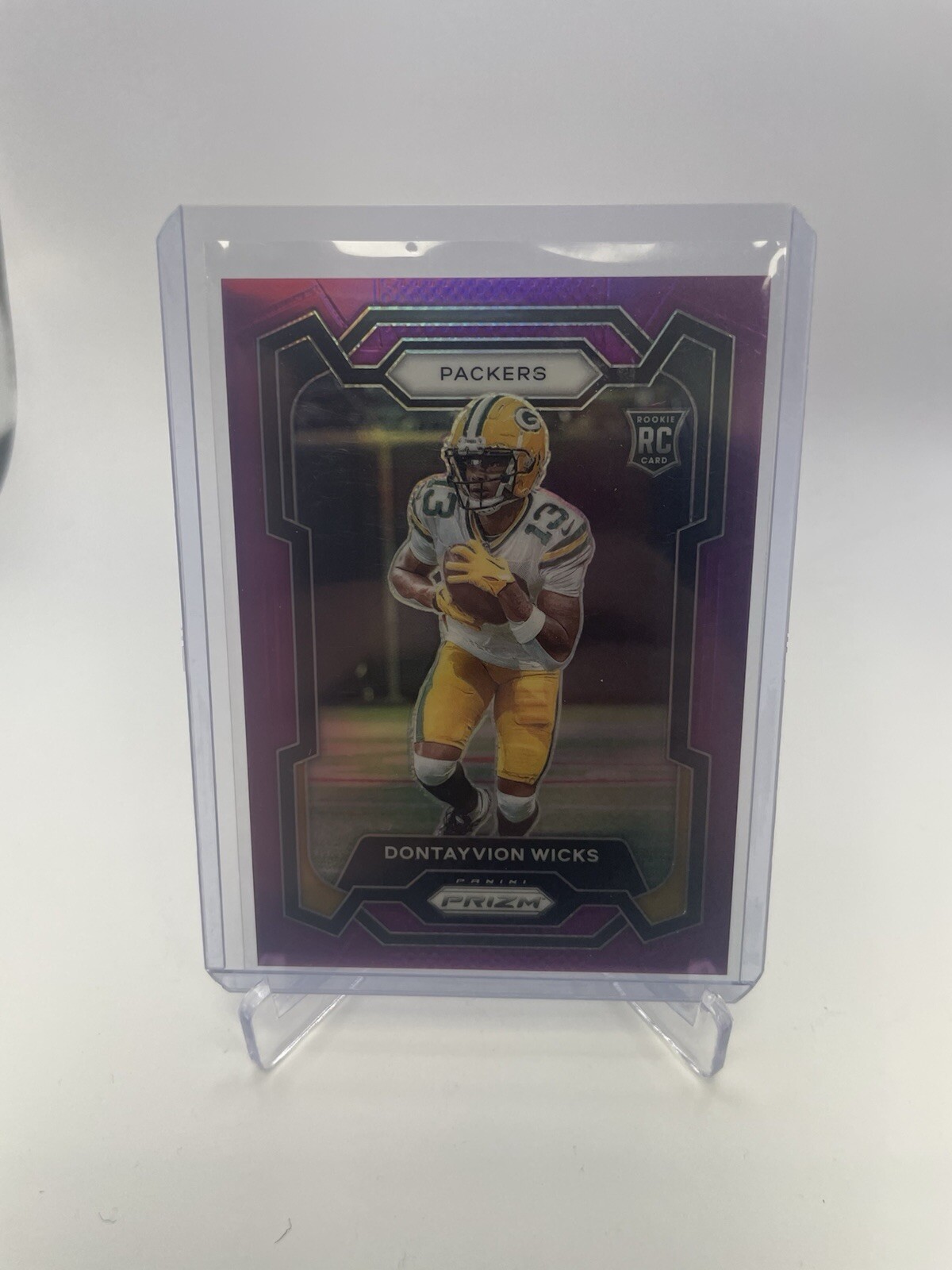 2023 Panini Prizm #333 Dontayvion Wicks RC Purple Prizm /125 SP KL