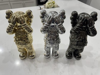 Kaws Holiday Space Figure Set (Gold Silver & Black)- Complete Set