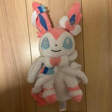 Sylveon Christmas Santa Plush Toy from the Pok mon Center