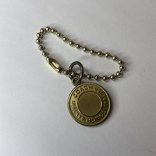 COACH 1" Round Hang Tag Fob Bag Charm, Metal Bleecker Token, Brass Ball Chain