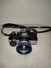Minolta 110 Zoom SLR camera, a unique single-lens reflex camera.