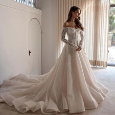 Elegant A-Line Wedding Dresses Strapless Long Sleeved Lace Beaded Sweep Train