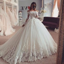 Elegant A-Line Wedding Dress Off Shoulder Long Sleeves Lace Applique Sweep Train