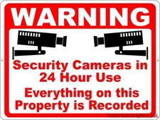 Security Sign. Warning Cameras in 24 Hour Use. Everything Recorded on Property 