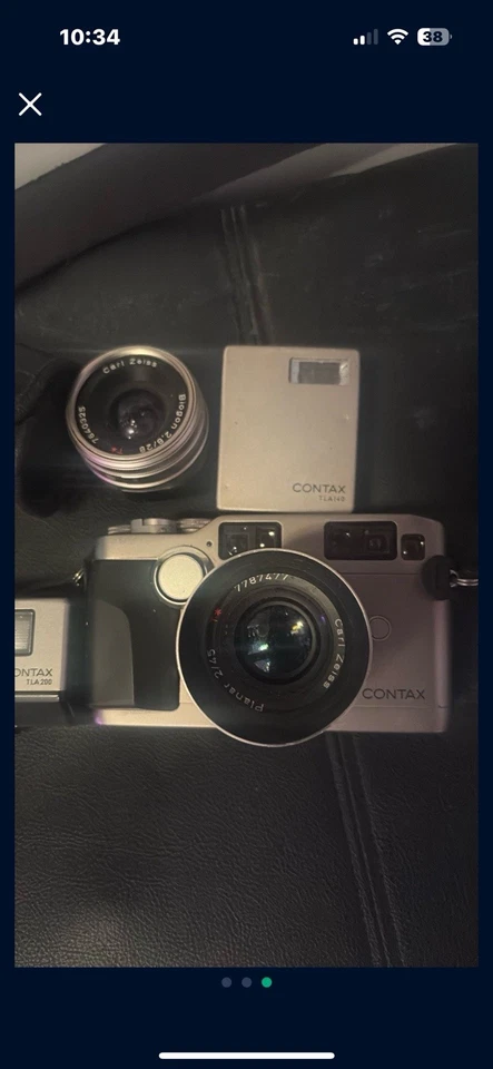 Cámara fotográfica Contax G2 telémetro 35 mm con lentes de 28 mm, 45 mm, 90 mm flash TLA 200 Foto 3 de 4