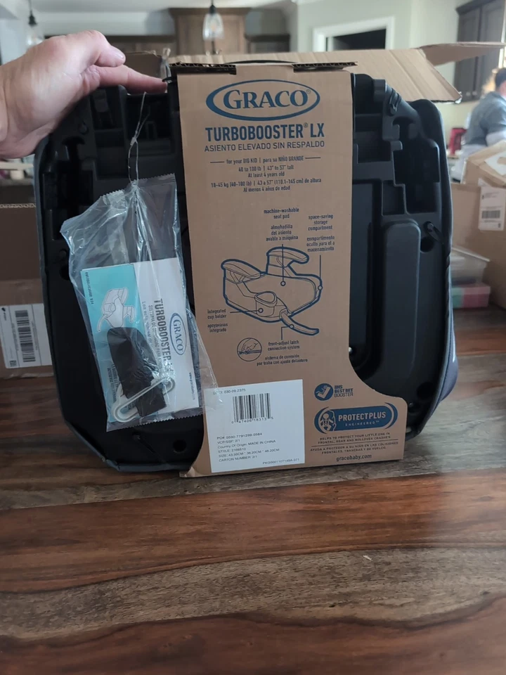 Compartimento de almacenamiento de asiento de auto elevador sin respaldo Graco TurboBooster LX Kamryn Foto 3 de 4