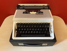 Vintage Underwood 310 Portable Typewriter with Case Made in Spain thumbnail