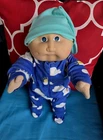 Adorable Freckled Faced Cabbage Patch Boy In Sunshine Pjs