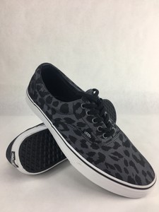 vans era leopard black