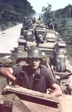 WW2 PICTURE PHOTO GERMAN SOLDIER IN A GERMAN TANK ON A CONVOY 6478