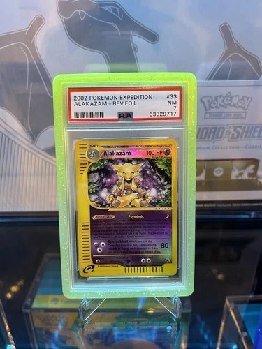 PSA 7 ALAKAZAM 1/165 | Expedition Reverse Holo e reader W Guard