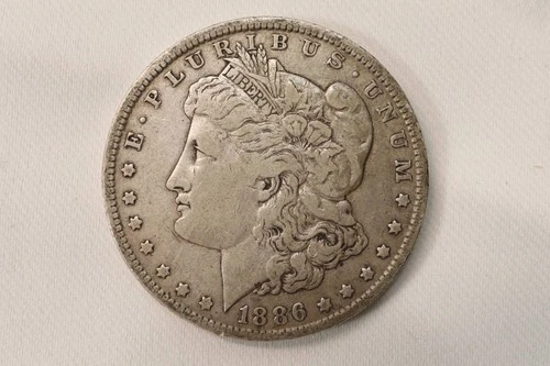NobleSpirit (ST) 1886 O Morgan Silver Dollar Fine