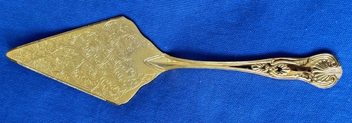 Silver Plated Gold Large Cake Serving Knife. 11.5 inch. Very nice condition.
