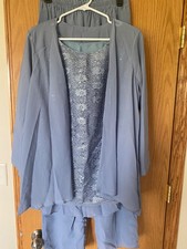 Womens pants, tank and light coat outfit