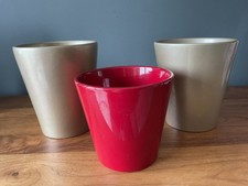 3 x Glazed Ceramic Plant Pot Holders 2 x Gold 1 x Red