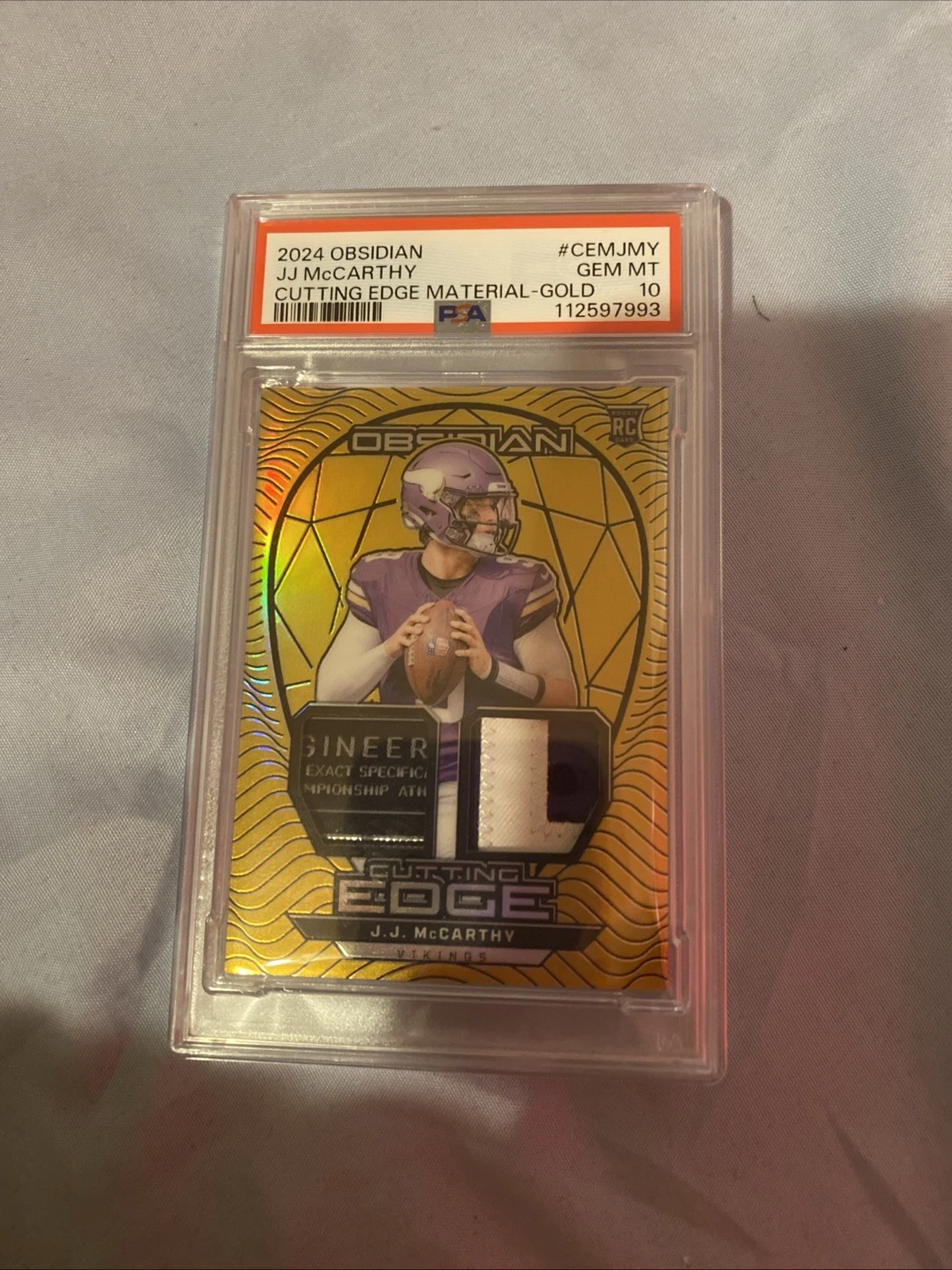 JJ McCarthy Panini Obsidian Cutting Edge Materials #CEMJMY Gold