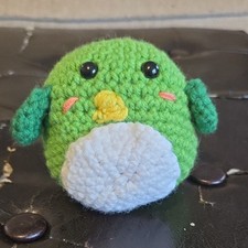 Handmade crochet green bird