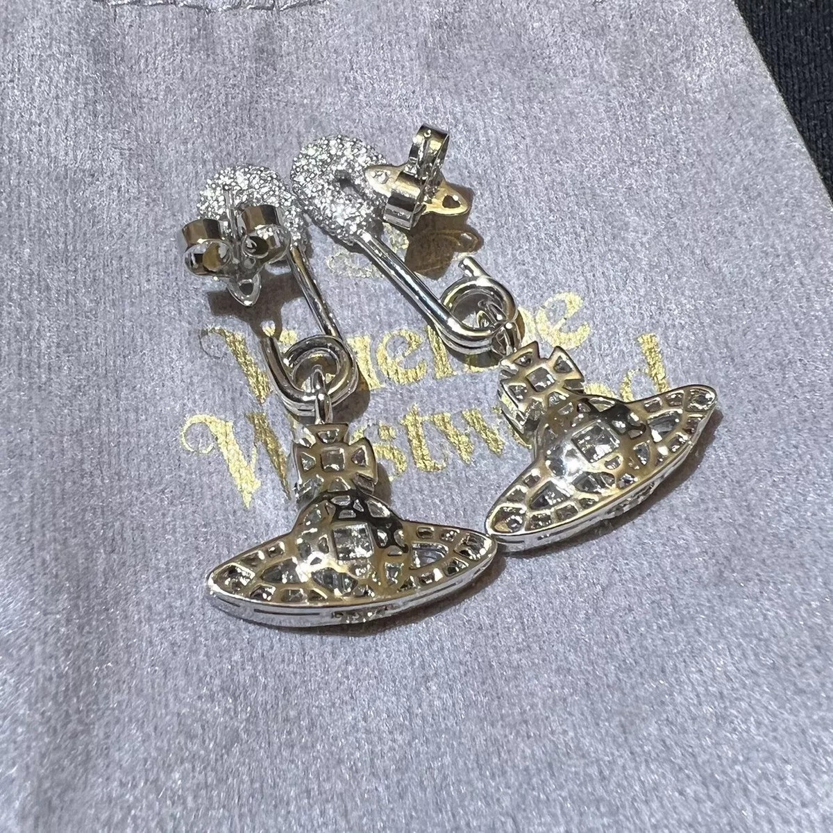 Vivienne Westwood nana silver tone safety pin orb earrings