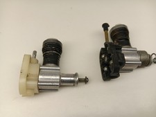 A set of Two Vintage Cox Product Engine .049 0.8 cm  Model Engine