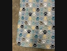 Adorable And Soft Puppy Paw Print Fleece Throw.