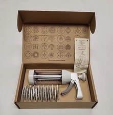 The Pampered Chef 1525 Cookie Press with 16 Discs - White