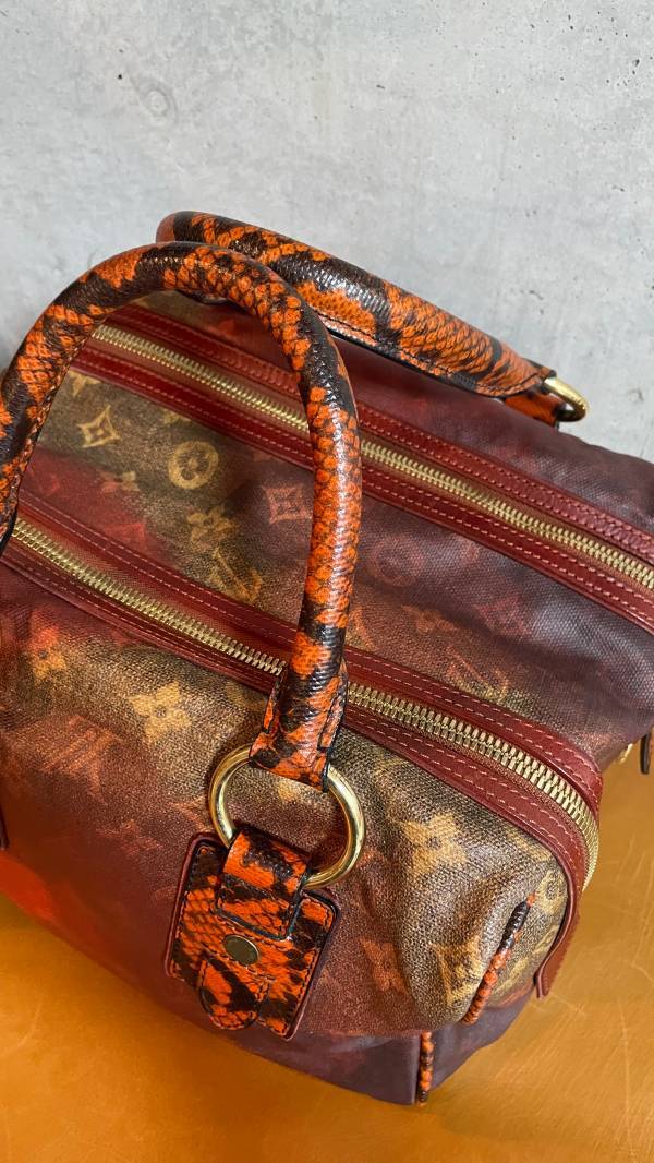 LOUIS VUITTON M95737 Monogram Jokes Man Crazy Leather Rouge