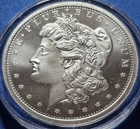 A 2 oz .999 Silver Morgan Style Proof Round Golden State Mint Capsule