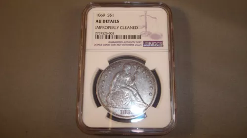 1869 Seated Liberty Dollar $1 - NGC AU Details: Improperly Cleaned (#RR19)