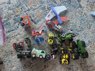 Transformers action figures and branded vehicles.