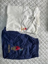 1996 Summer Olympics Gear including a Hanes Knit Shirt and Speedo Swim Trunks