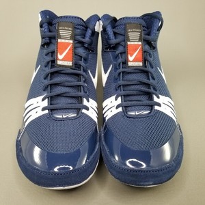 navy blue and white nike shoes