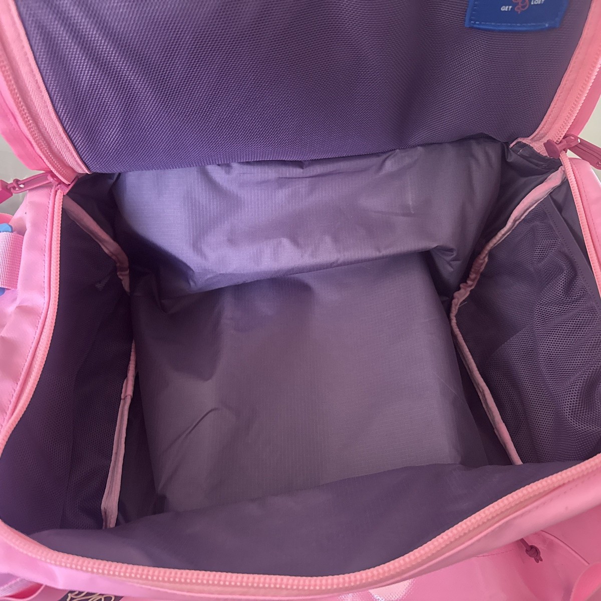 Baboon to the Moon Cotton Candy Pink Go Bag Mini 32L With Slight Discoloration Baboon to the Moon 32L Go-Bag Mini fits! (Delta) : r/HerOneBag main image 4