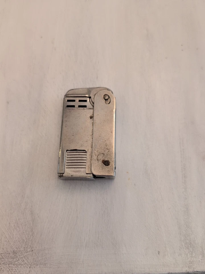 Vintage AAA Advertising Regens Stormliter Squeeze Lighter Not Working - Image 2 of 4