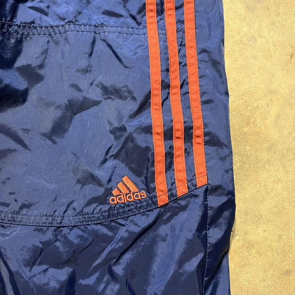 Pantalones deportivos cortavientos vintage Y2k Adidas azul marino/naranja Foto 2 de 3