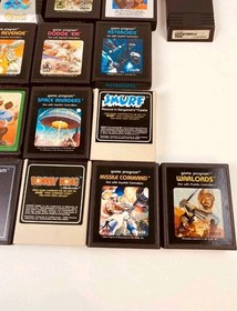 Atari 7800 console with 35 games, 2 controllers, power cord, storage case WORKS