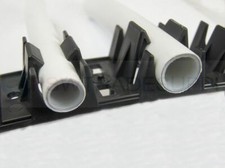 UNDERFLOOR HEATING BLACK CLIP RAIL SELF ADHESIVE FOR 15 OR 16MM PLASTIC PIPE