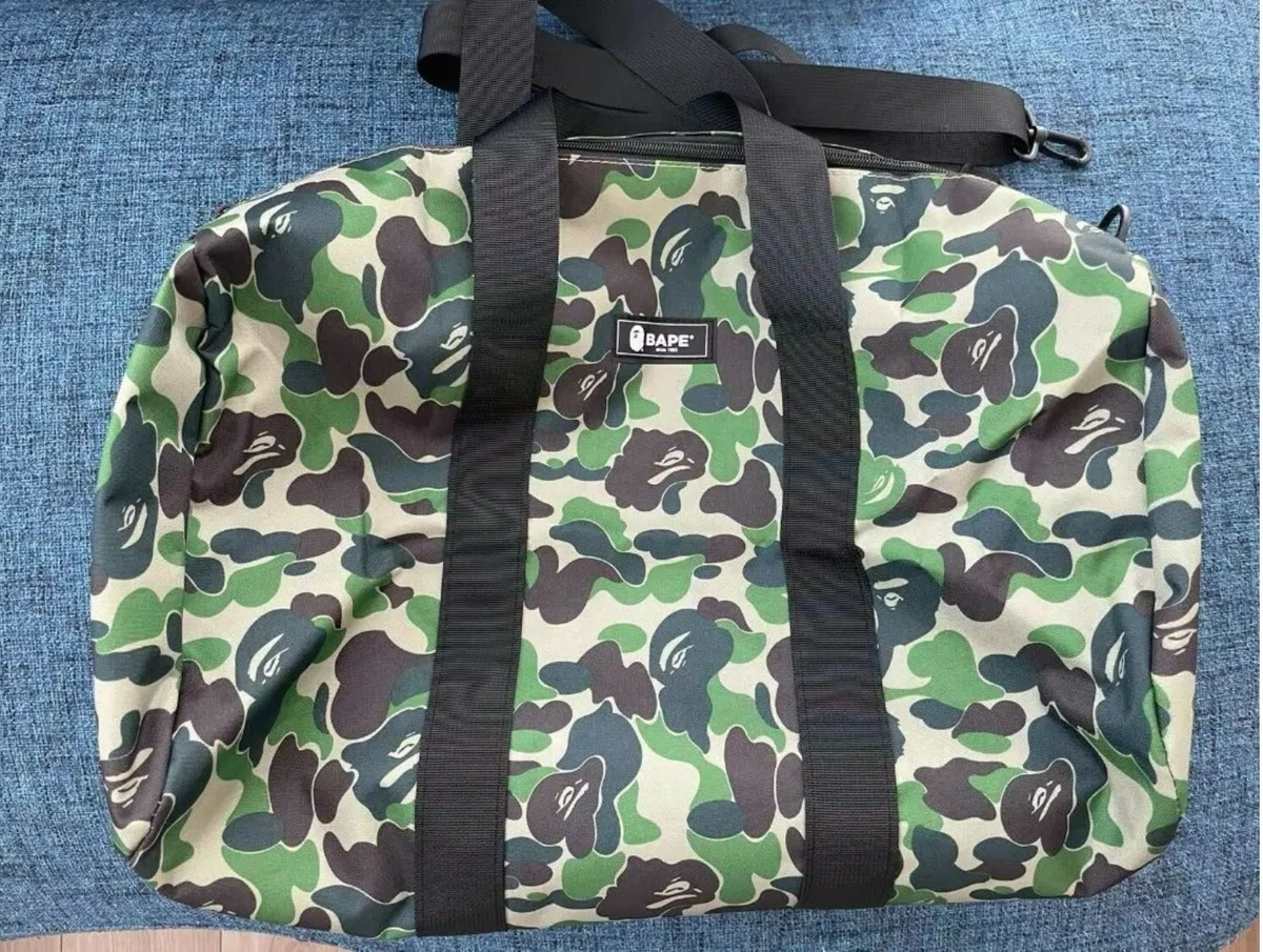 A BATHING APE® X Outdoor Products Camo Duffle Bag - Green