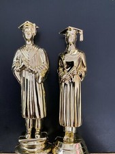 One new old stock 5" graduate trophy topper