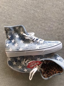 white and leopard print vans