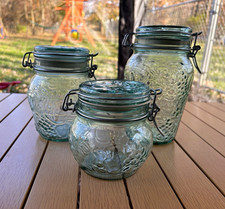 Set of 3 Clear Glass beveled jars.