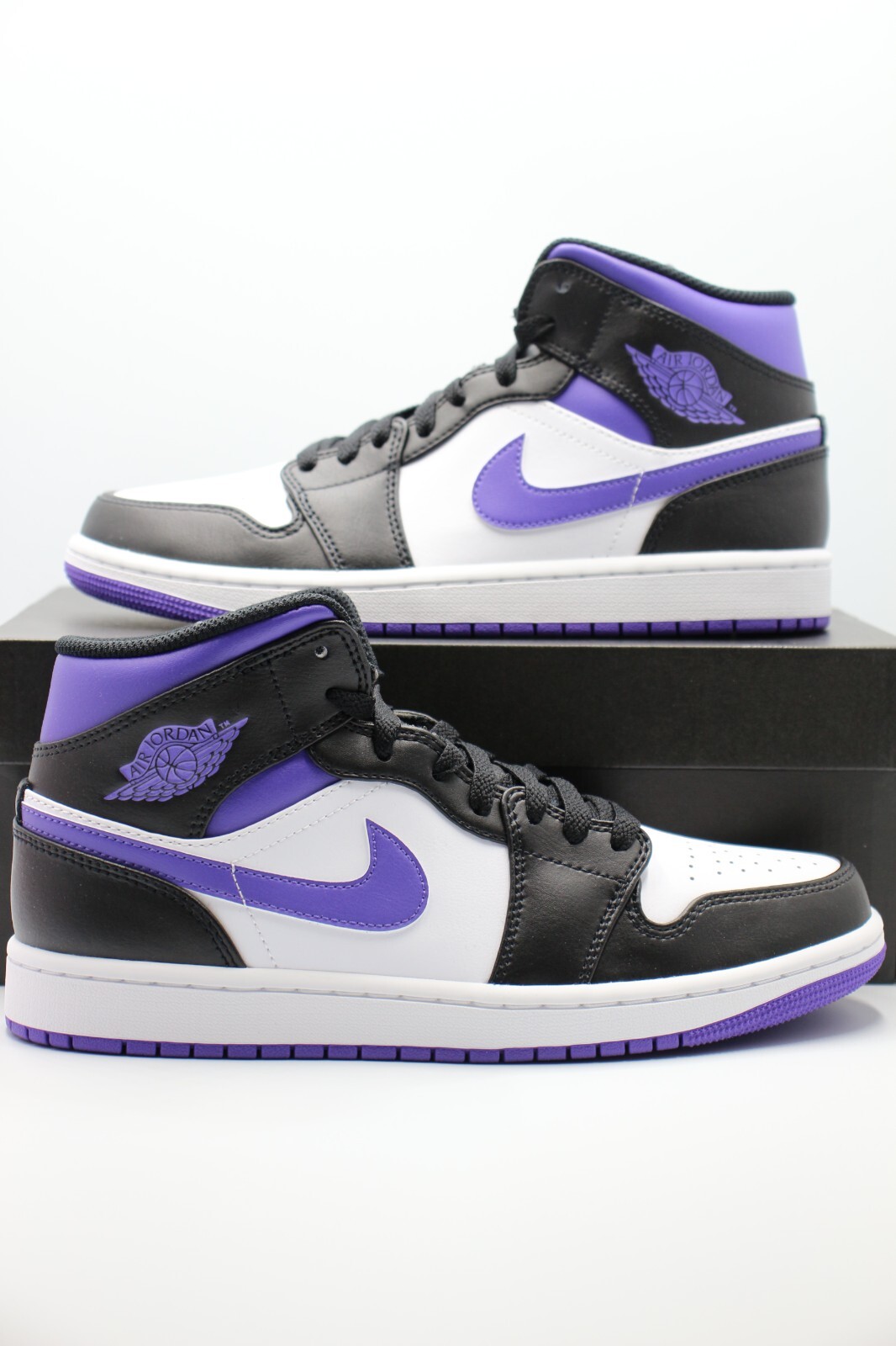 black and purple high top jordans